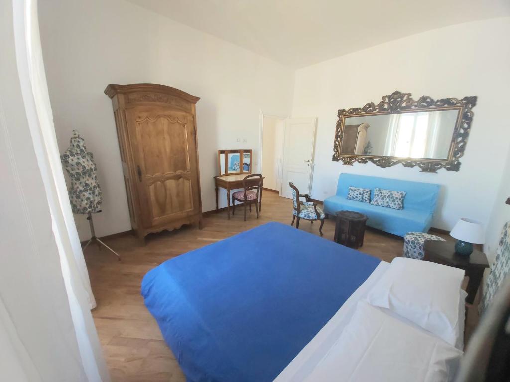 Säng eller sängar i ett rum på House In The Light VATICAN Appartamento per vacanze