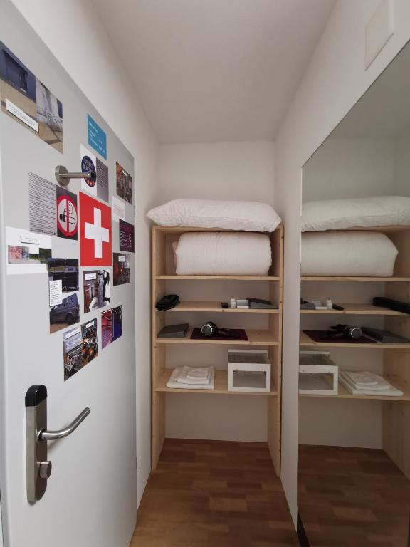 Postel nebo postele na pokoji v ubytování Hotel16 by Messe & Stadion Suisse in Minuten & Late Check-in