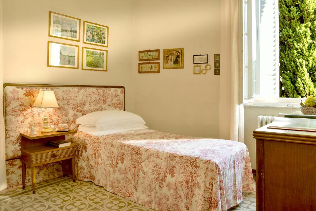 Postel nebo postele na pokoji v ubytování Villa Carlotta con piscina