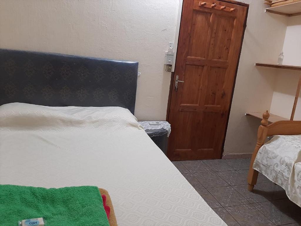 Postel nebo postele na pokoji v ubytování Posada las Mercedes