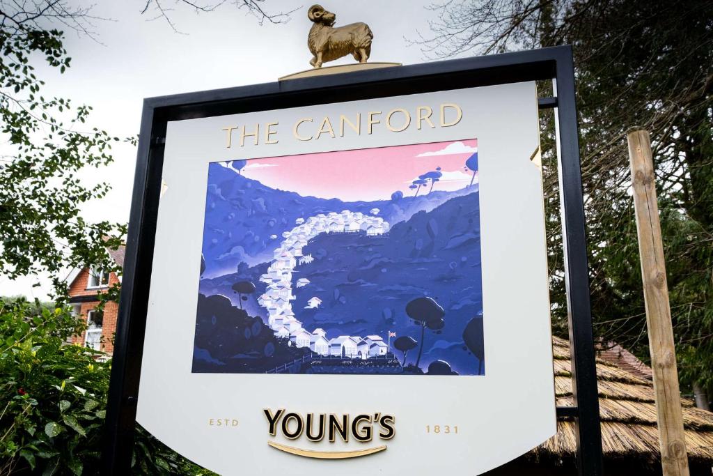 a sign for the carored yungs in the mountains at The Canford in Poole
