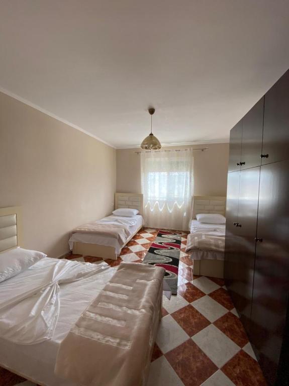 Letto o letti in una camera di Dibra's Apartment