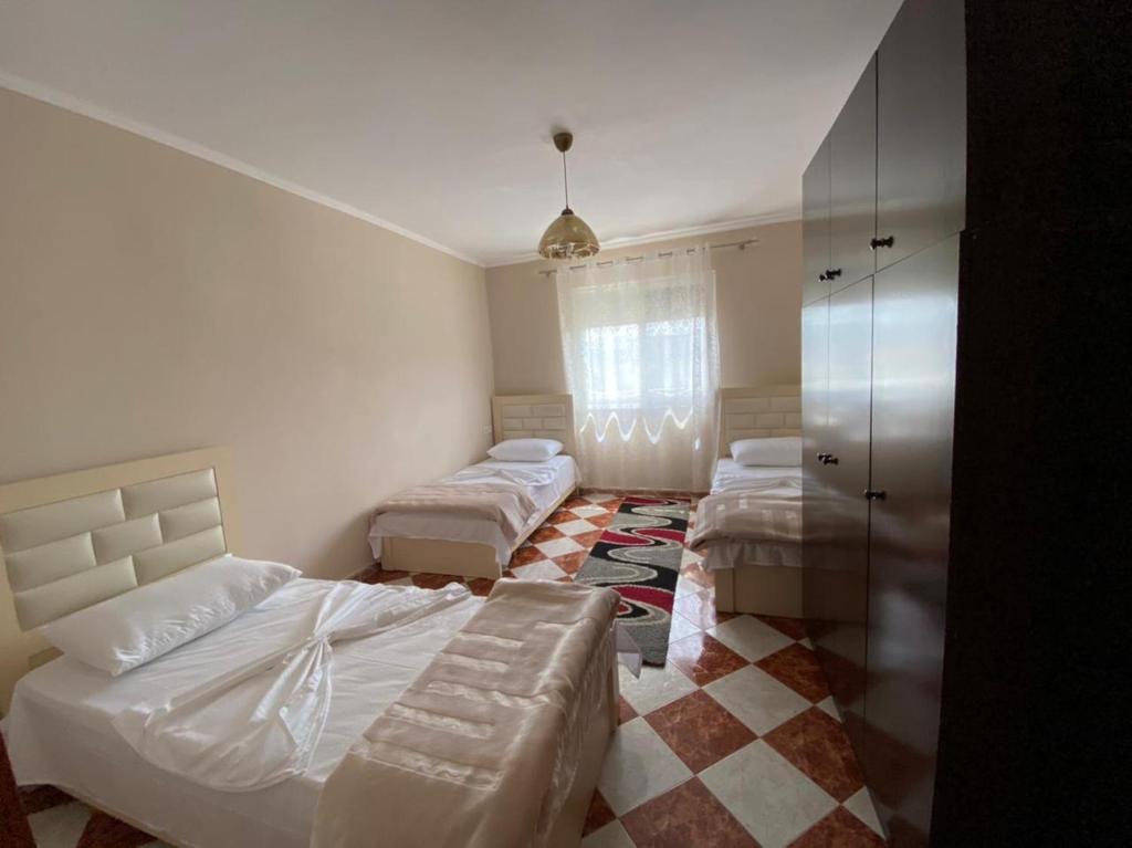 Letto o letti in una camera di Dibra's Apartment