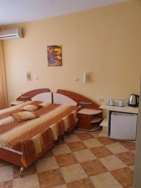 Postel nebo postele na pokoji v ubytování VENIS hotel