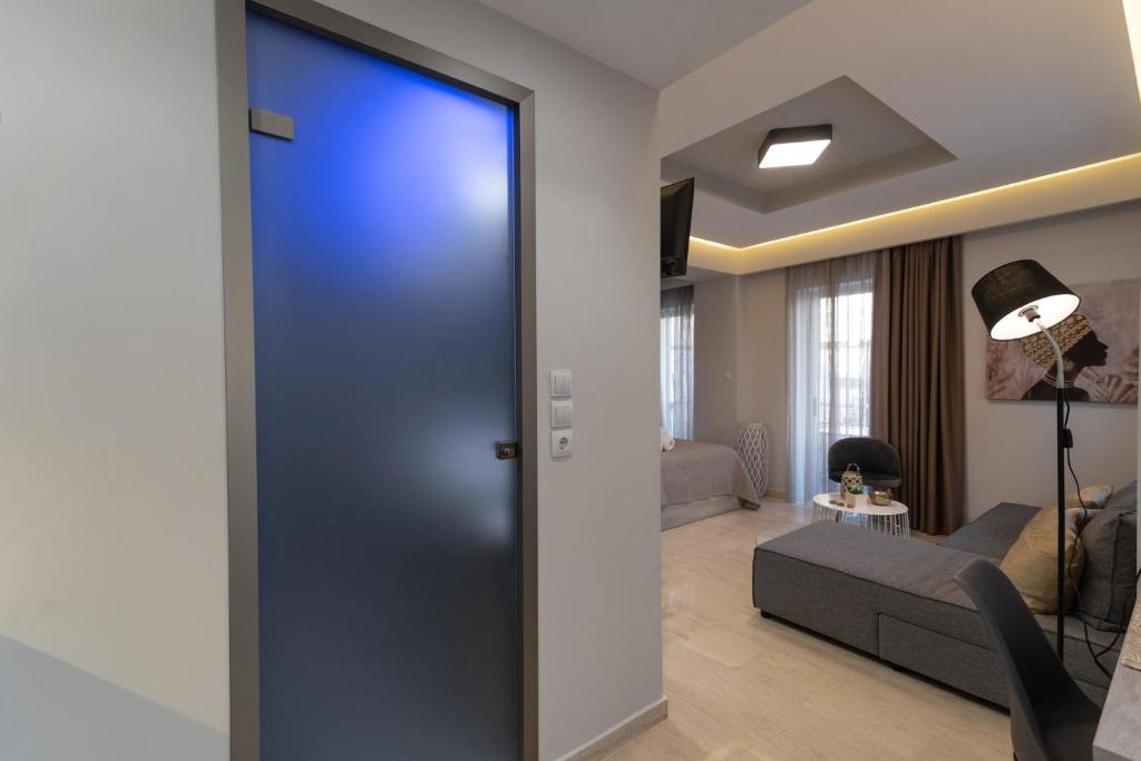 Łóżko lub łóżka w pokoju w obiekcie Αqua Dream Beach Apartment