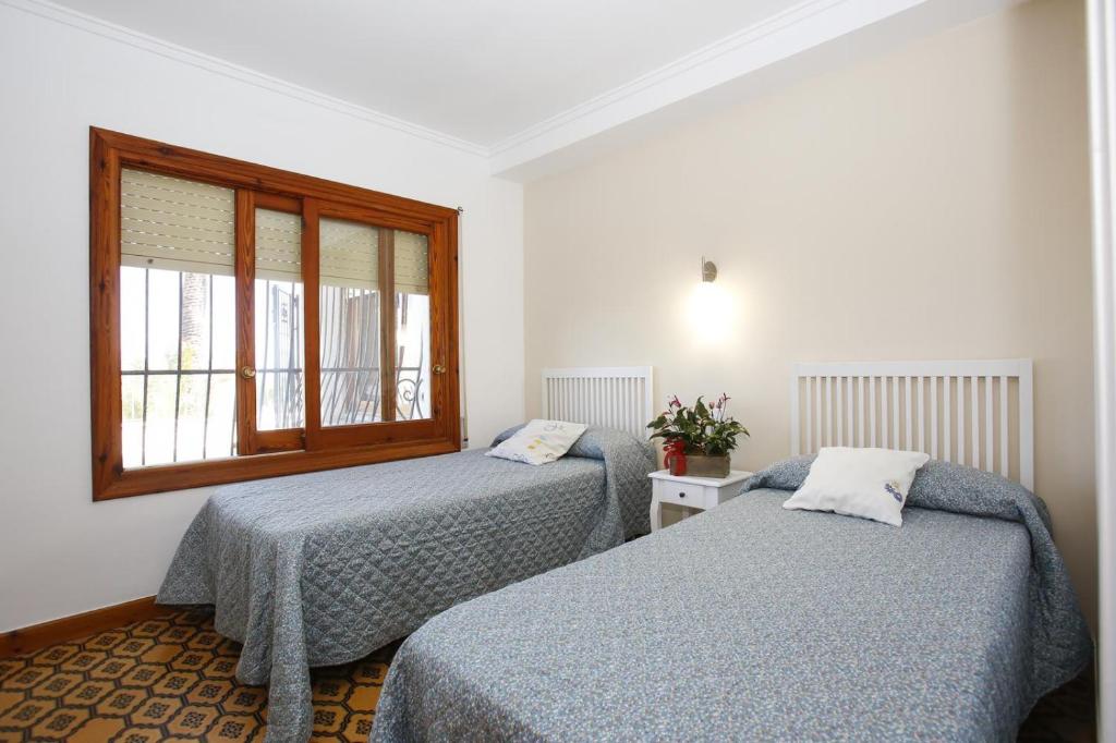 Postel nebo postele na pokoji v ubytování 030 Villa Marines - Deniasol