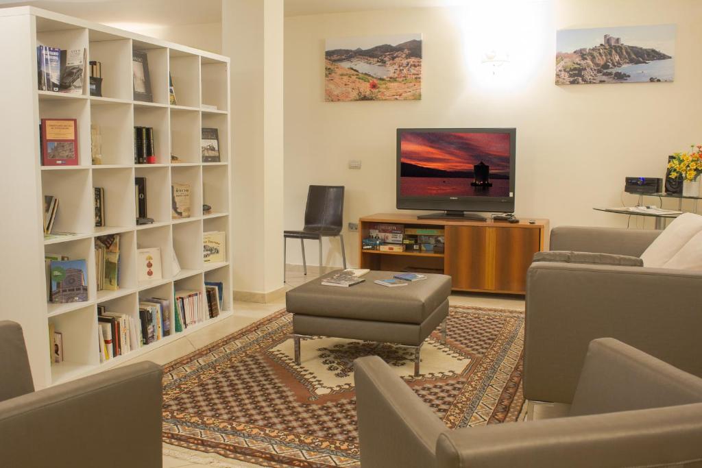 TV a/nebo společenská místnost v ubytování Hotel Corallo