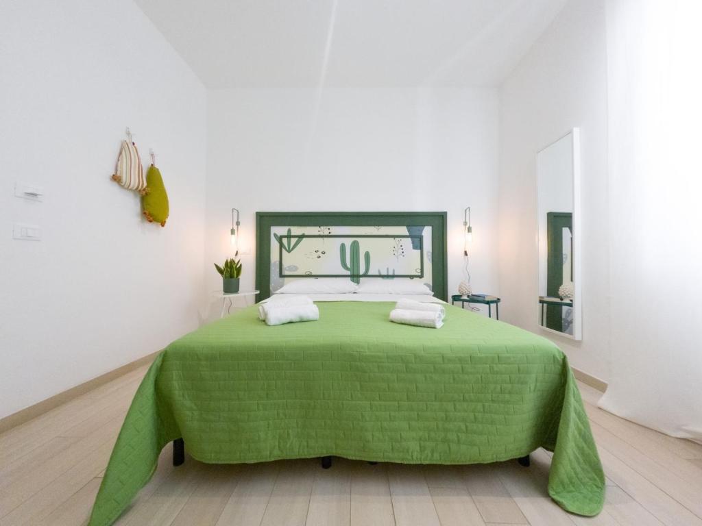 Postel nebo postele na pokoji v ubytování Donna Maria b&b