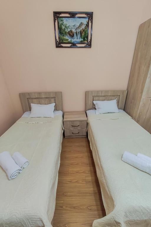 Postel nebo postele na pokoji v ubytování Hotel Pushkin II/1a