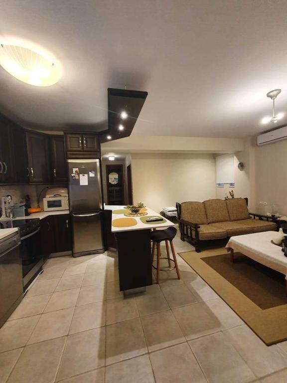 Kuchyň nebo kuchyňský kout v ubytování cozy apartment nafpaktos