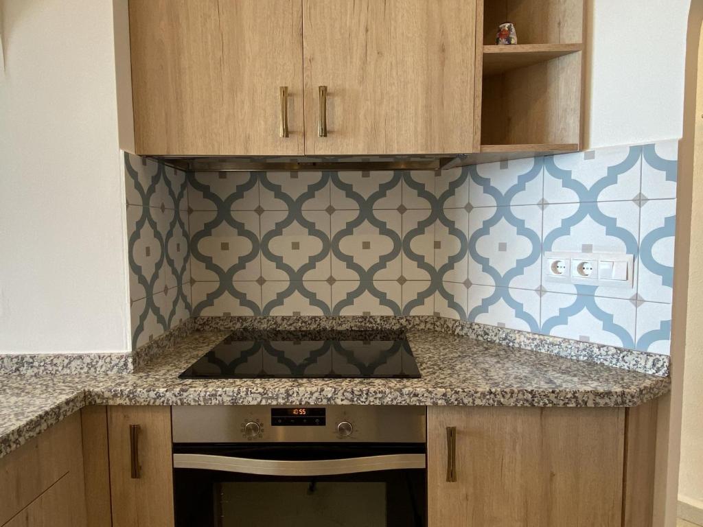 Kuchyň nebo kuchyňský kout v ubytování Bahia 46 Apartments Casasol
