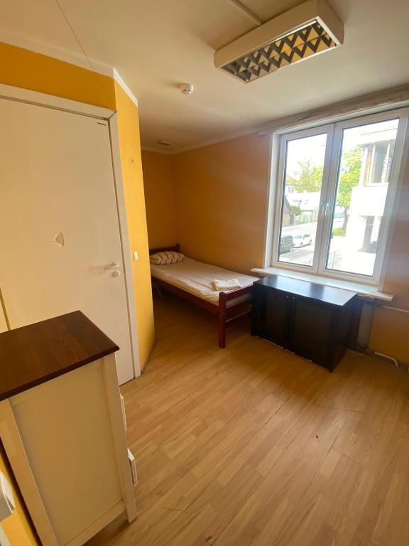 Postel nebo postele na pokoji v ubytování Telliskivi Hostel