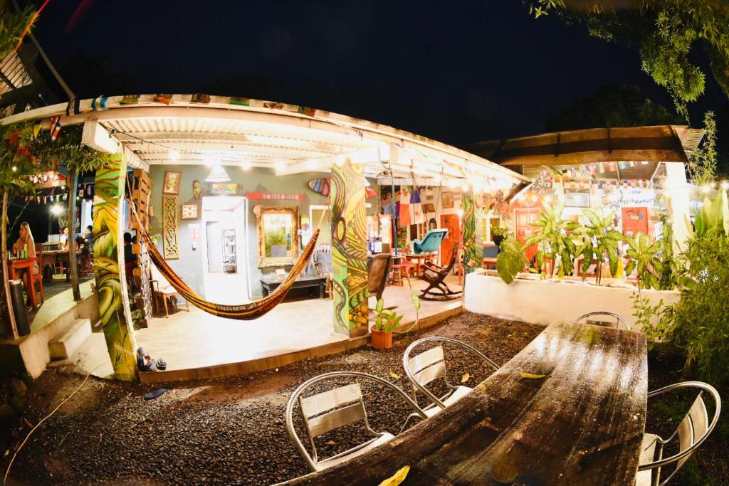 a restaurant with a table and chairs in front of it at Hostal La Casa de Juan in Valle de Anton