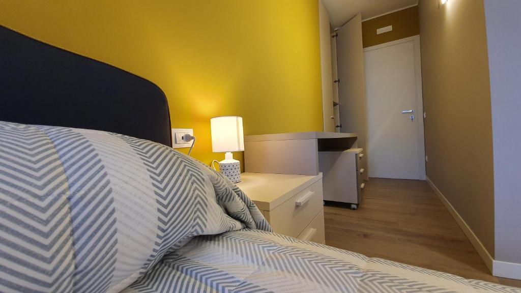 Postel nebo postele na pokoji v ubytování Appartamenti Moonlight