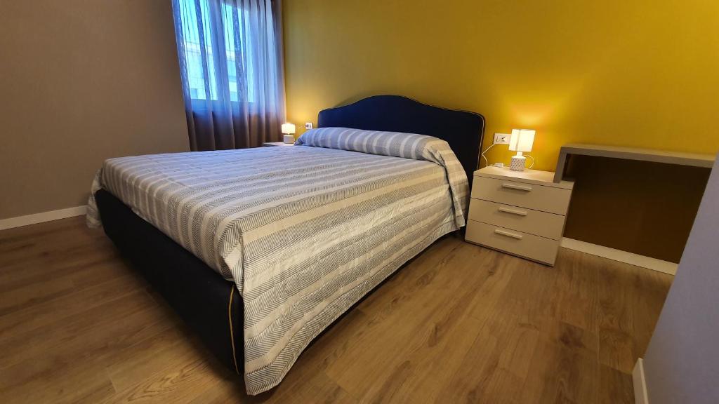 Postel nebo postele na pokoji v ubytování Appartamenti Moonlight