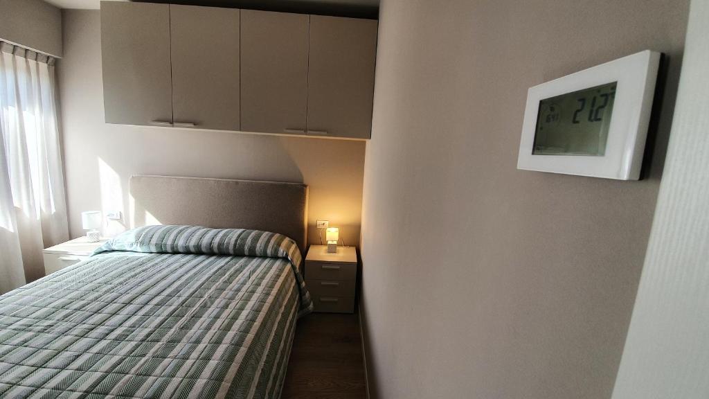 Postel nebo postele na pokoji v ubytování Appartamenti Moonlight