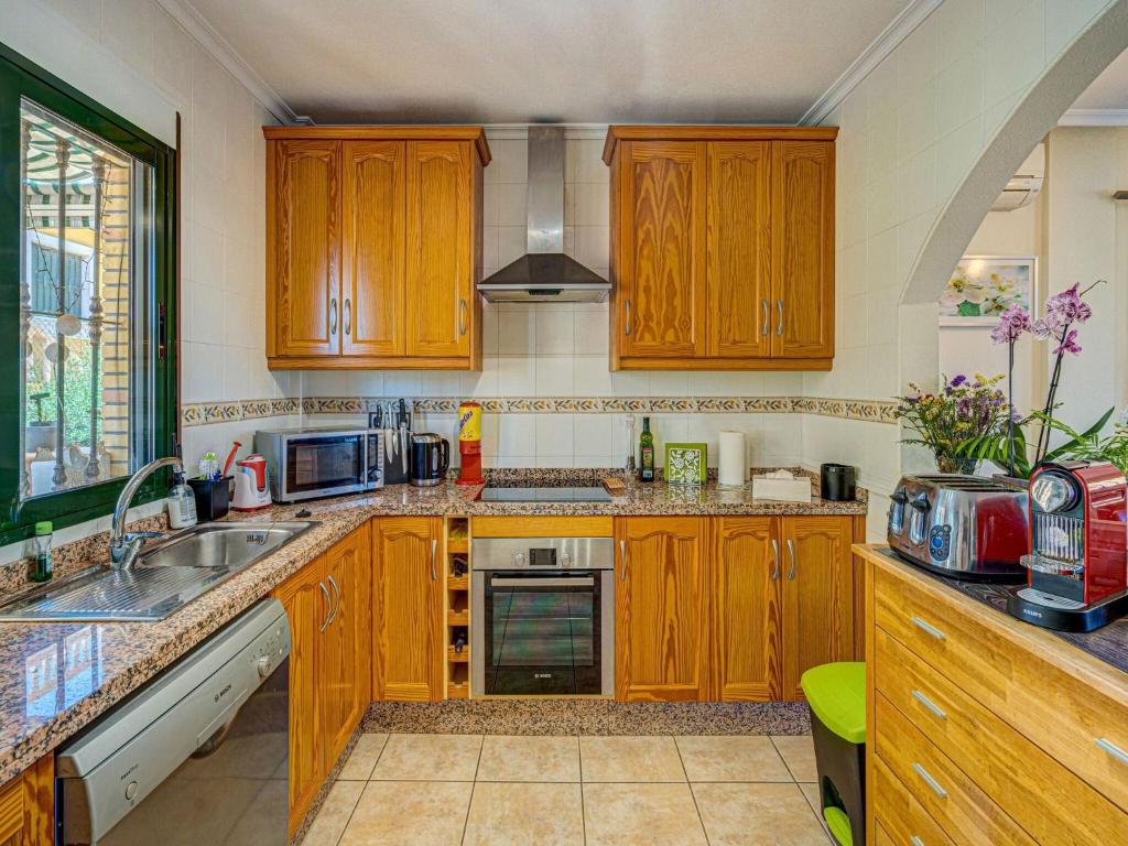 Kuchyň nebo kuchyňský kout v ubytování Casa vacanze a Orihuela con giardino