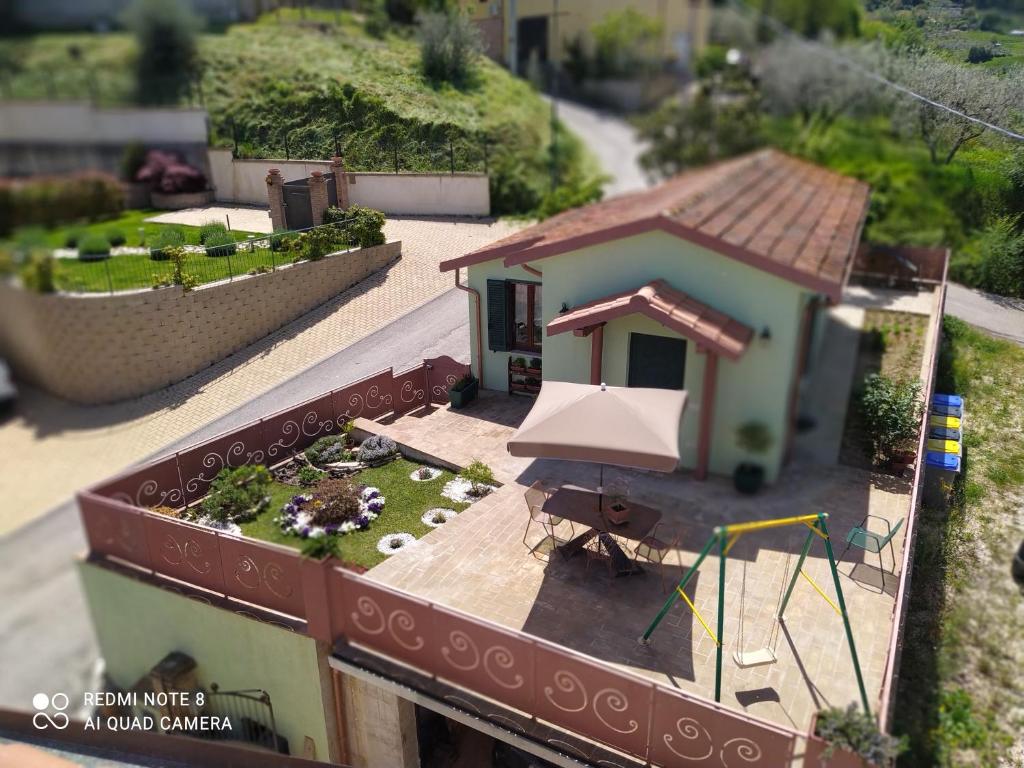 a model of a small house on a bridge at Villa Eden in Montefalco