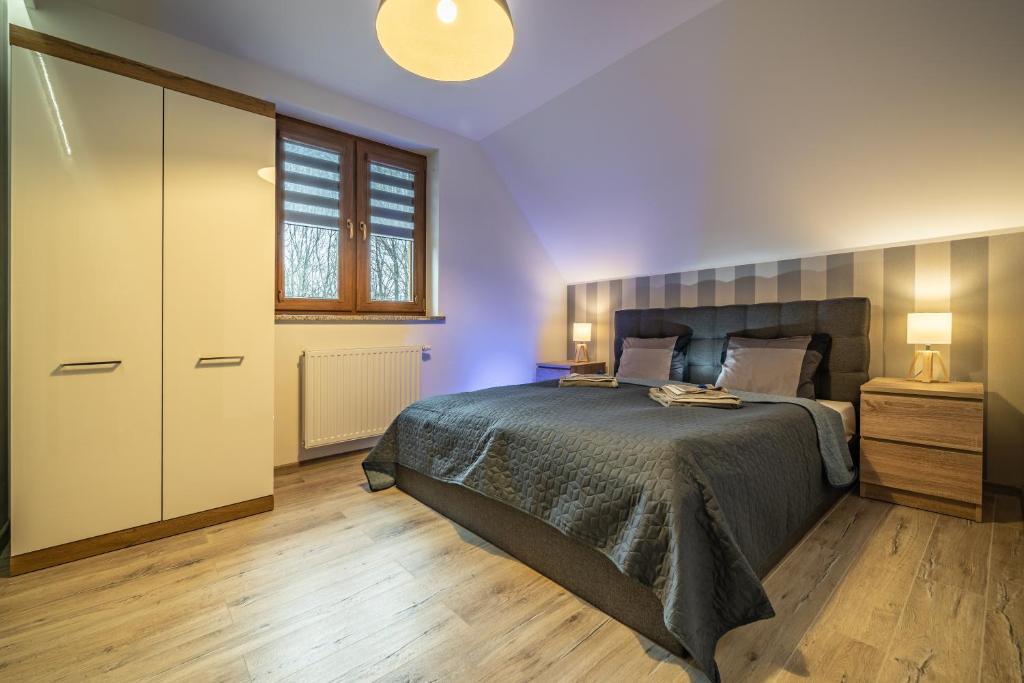 Posteľ alebo postele v izbe v ubytovaní Apartamenty Bunny Aparts