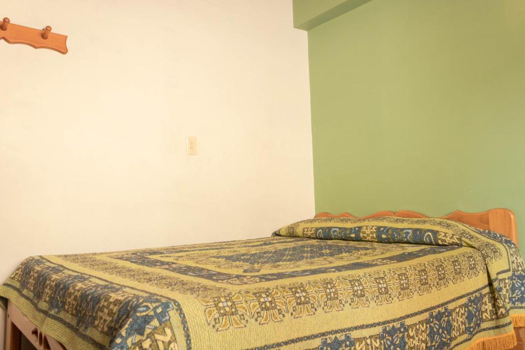 Postel nebo postele na pokoji v ubytování Hotel Felicina