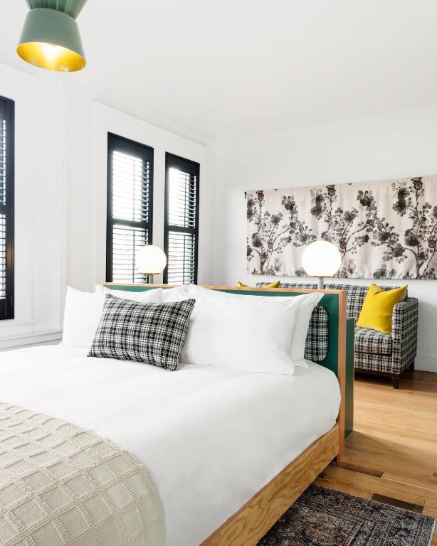 Postel nebo postele na pokoji v ubytování Hotel Grand Stark