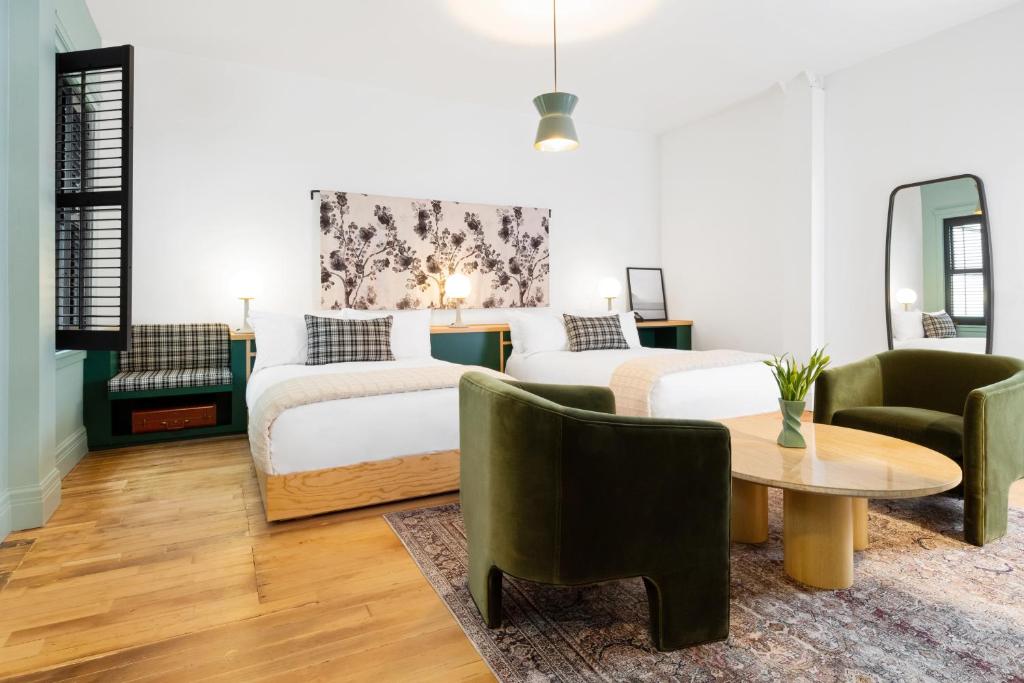 Postel nebo postele na pokoji v ubytování Hotel Grand Stark