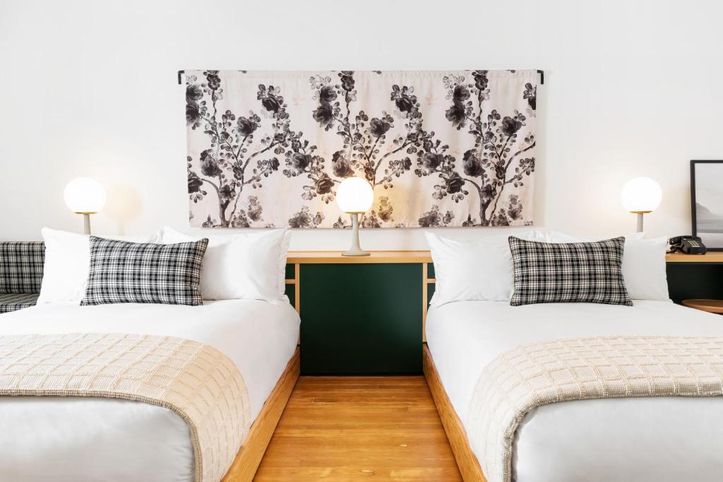 Postel nebo postele na pokoji v ubytování Hotel Grand Stark