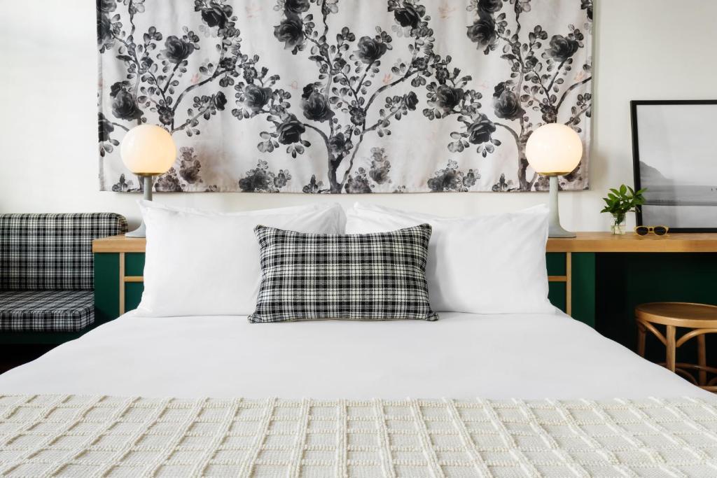Postel nebo postele na pokoji v ubytování Hotel Grand Stark