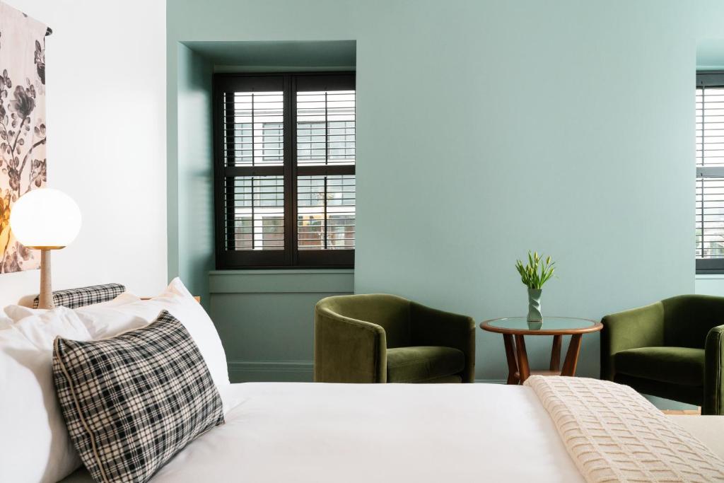 Postel nebo postele na pokoji v ubytování Hotel Grand Stark