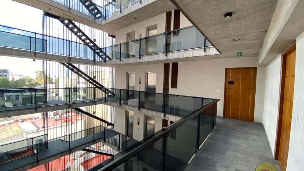 Un balcón o terraza en Del Parque Suites
