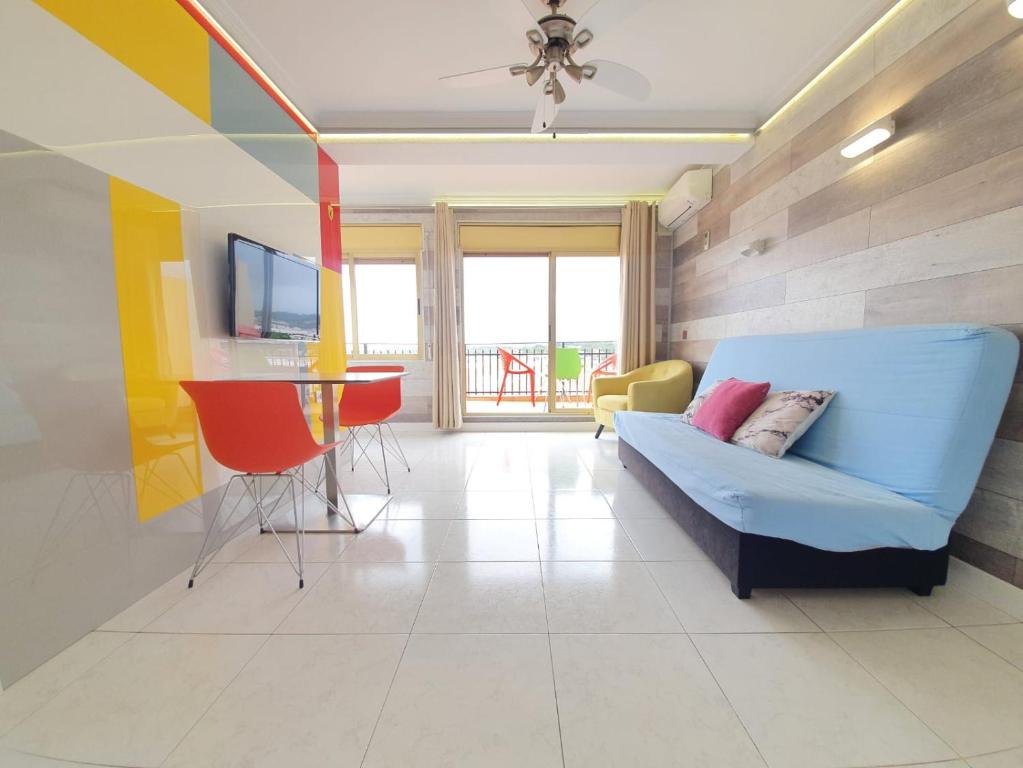TV a/nebo společenská místnost v ubytování Apartamento en Salou con las vistas al Port Aventura