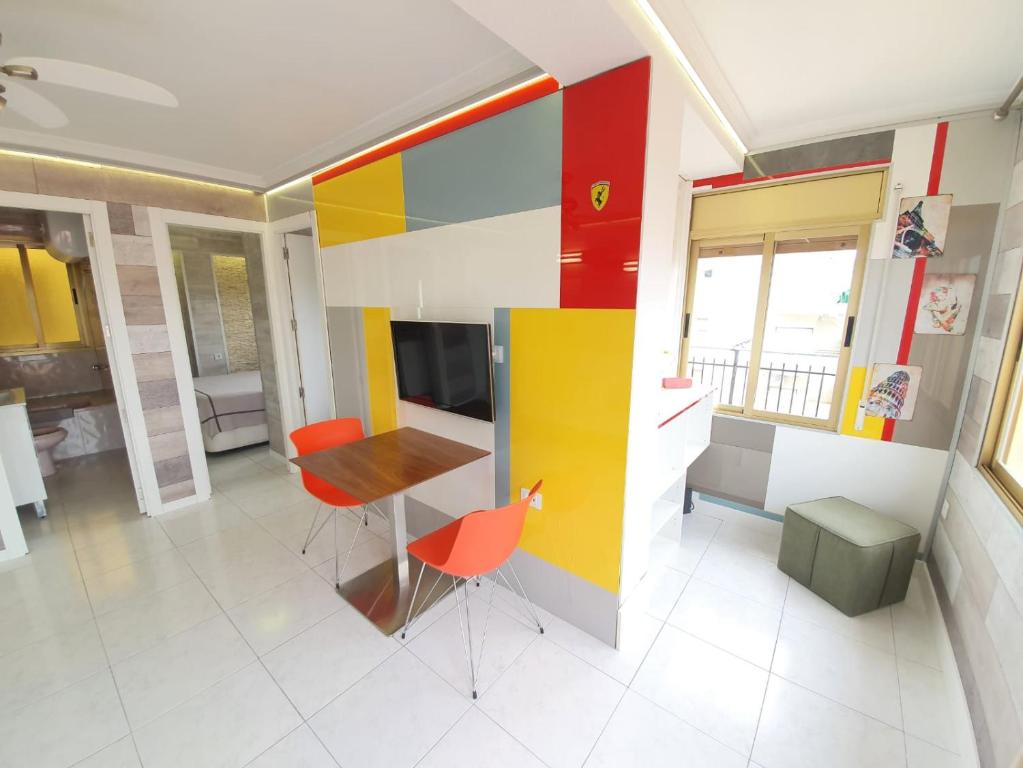 TV a/nebo společenská místnost v ubytování Apartamento en Salou con las vistas al Port Aventura