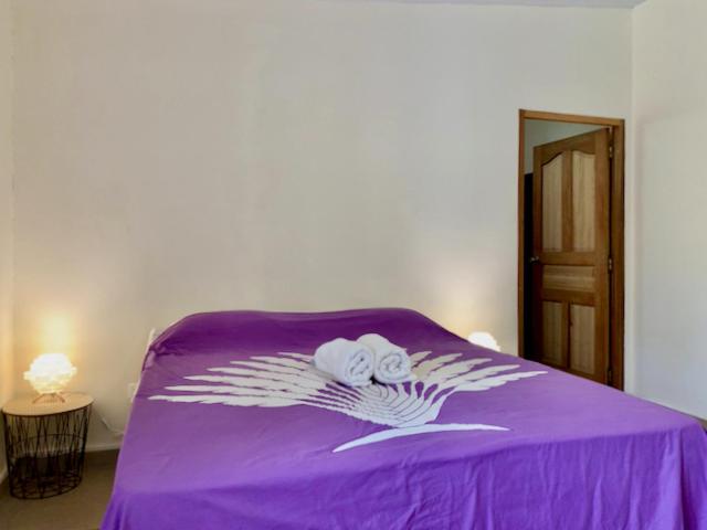 Uma cama ou camas num quarto em Va'a i te Moana