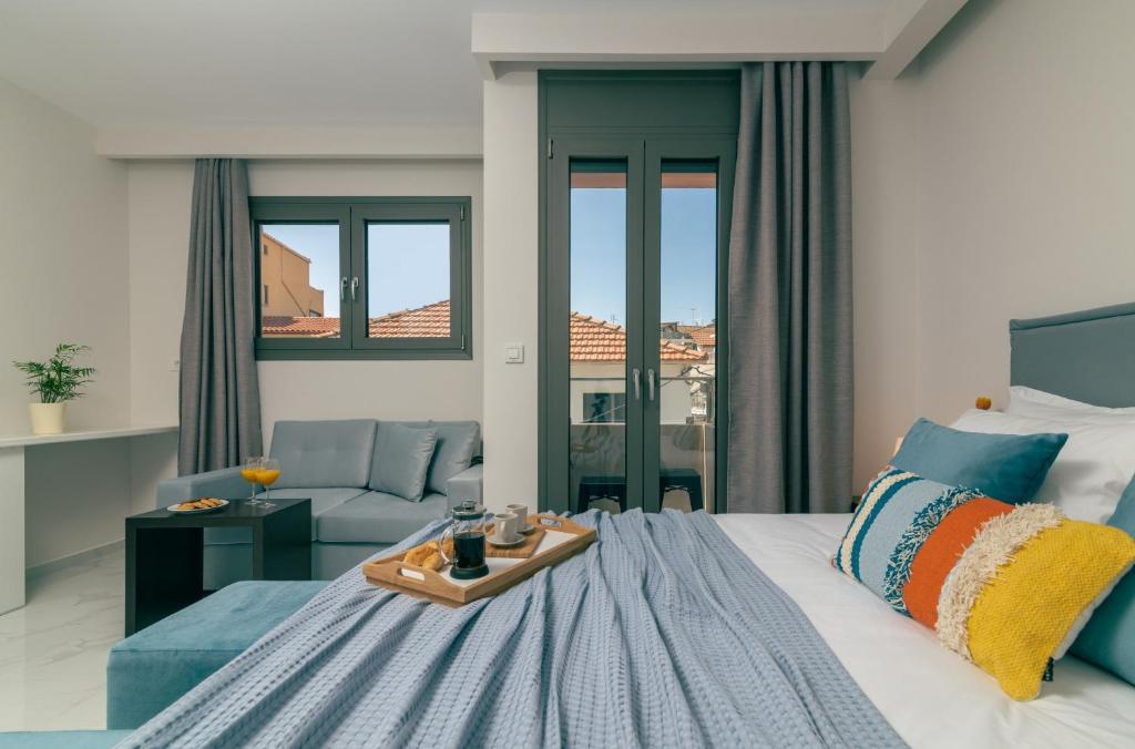 Postel nebo postele na pokoji v ubytování Centro Studios & Apartments