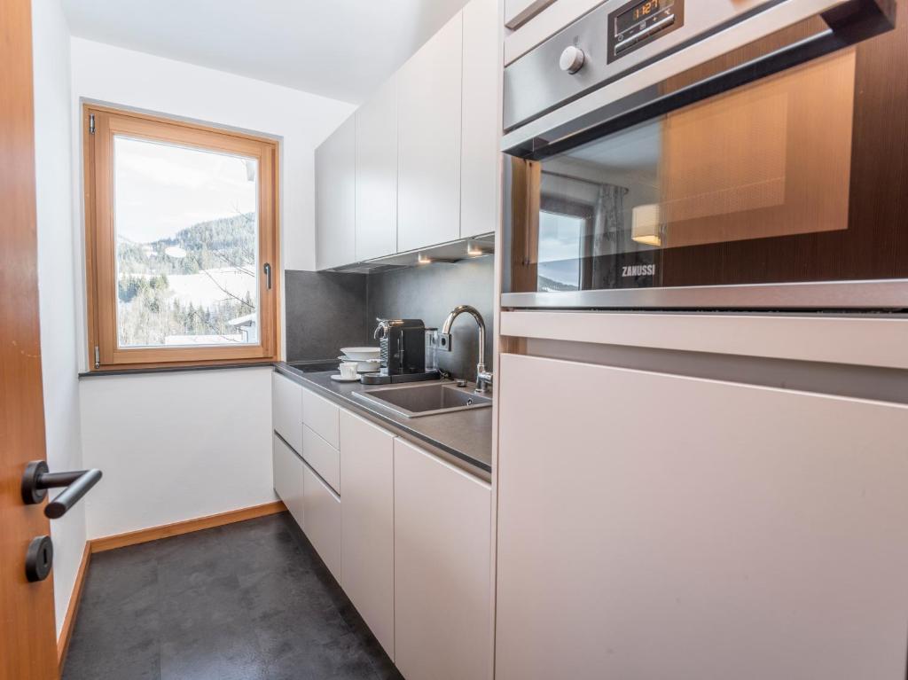 Kuchyň nebo kuchyňský kout v ubytování Haus Widmann