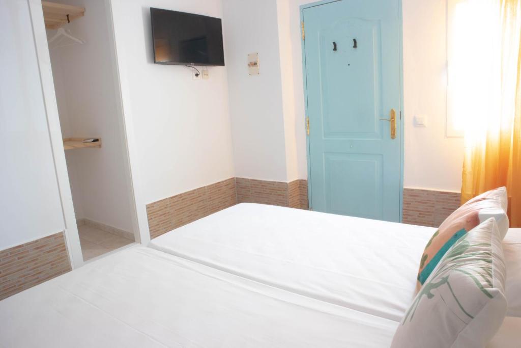 Posteľ alebo postele v izbe v ubytovaní Salitre Rooms