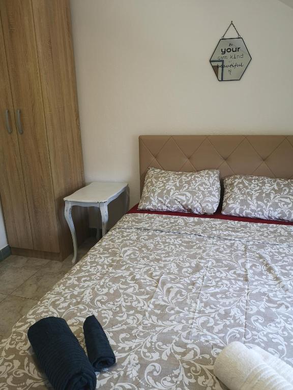 Postel nebo postele na pokoji v ubytování Apartman Kosta
