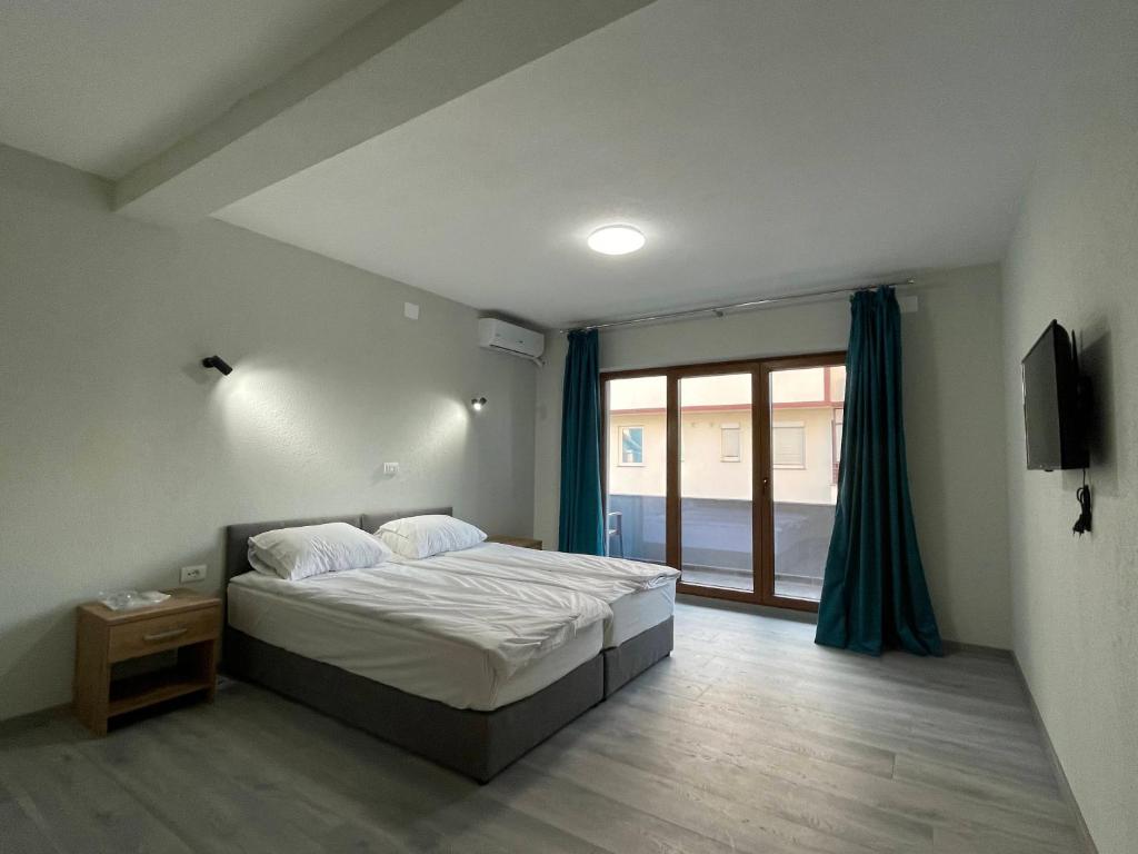 Postel nebo postele na pokoji v ubytování Villa Aria