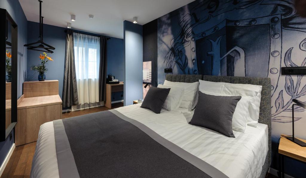 Postel nebo postele na pokoji v ubytování Camera Hotel