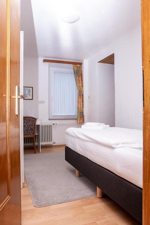 Postel nebo postele na pokoji v ubytování Hotel Huberty Kautenbach