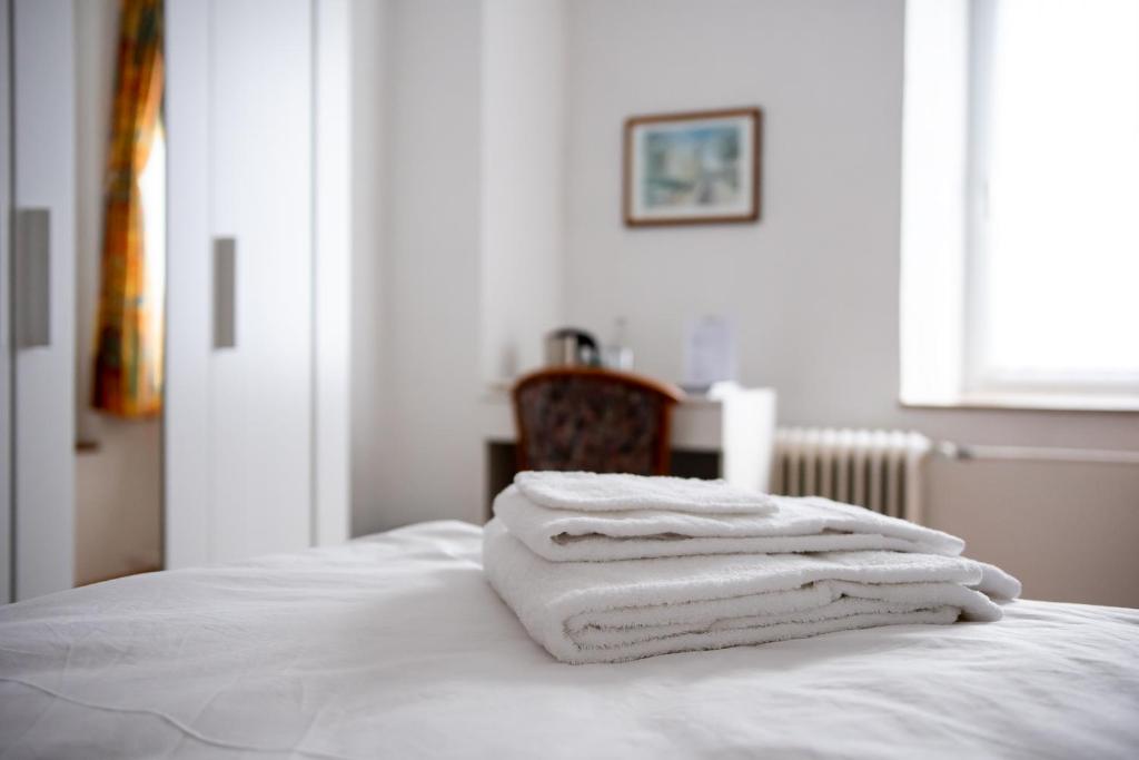 Postel nebo postele na pokoji v ubytování Hotel Huberty Kautenbach