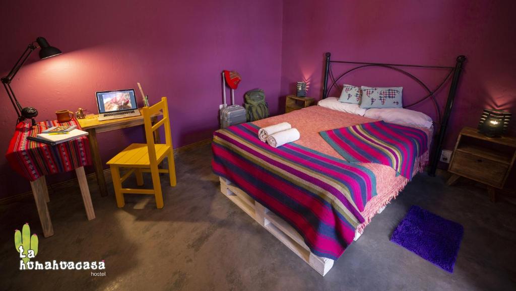 Postel nebo postele na pokoji v ubytování Hostel La Humahuacasa