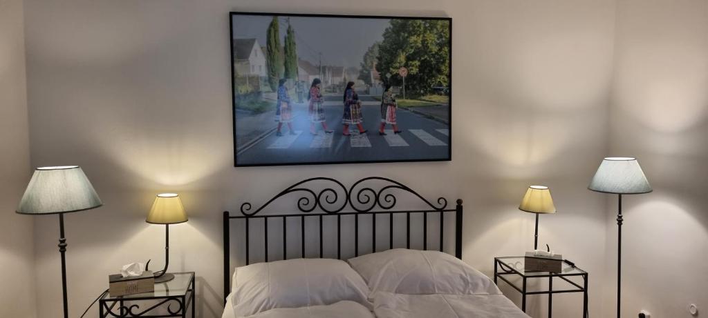 Postel nebo postele na pokoji v ubytování Konšelský šenk Domažlice