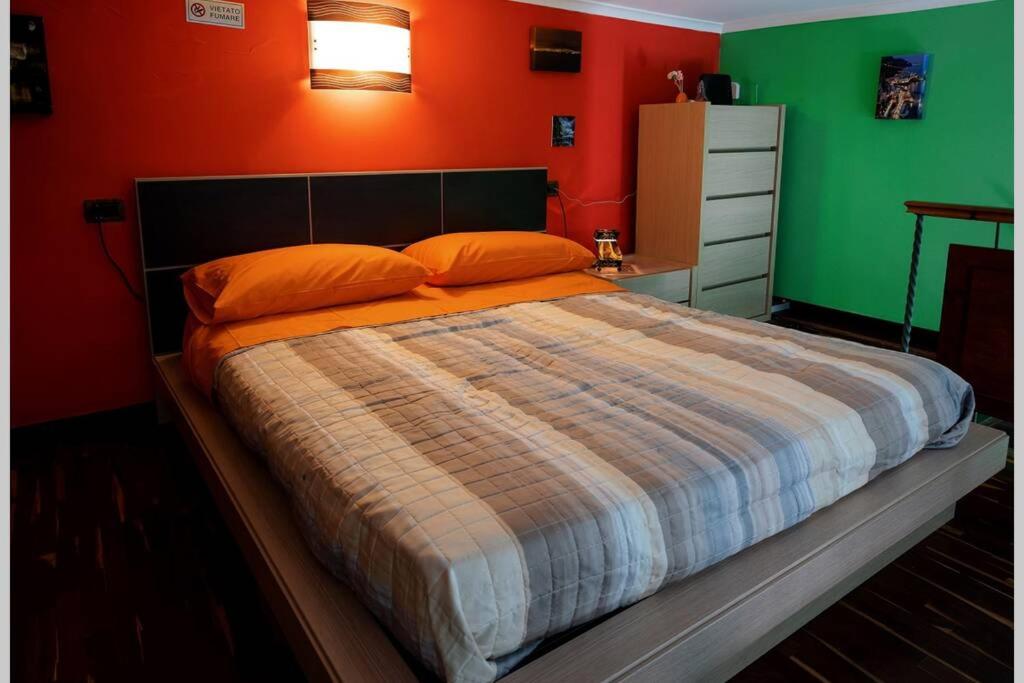 Posteľ alebo postele v izbe v ubytovaní CASA VACANZE FUNNY HOUSE CONSALVO