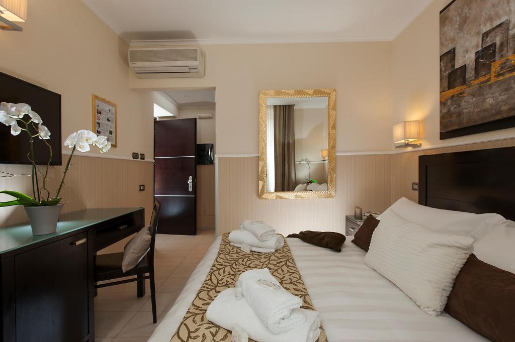 Postel nebo postele na pokoji v ubytování Yes Hotel Boutique Rome