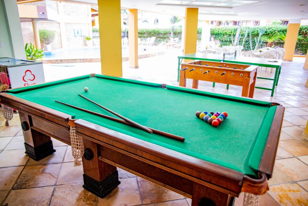 Mesa de bilhar em Pizzato Praia Hotel