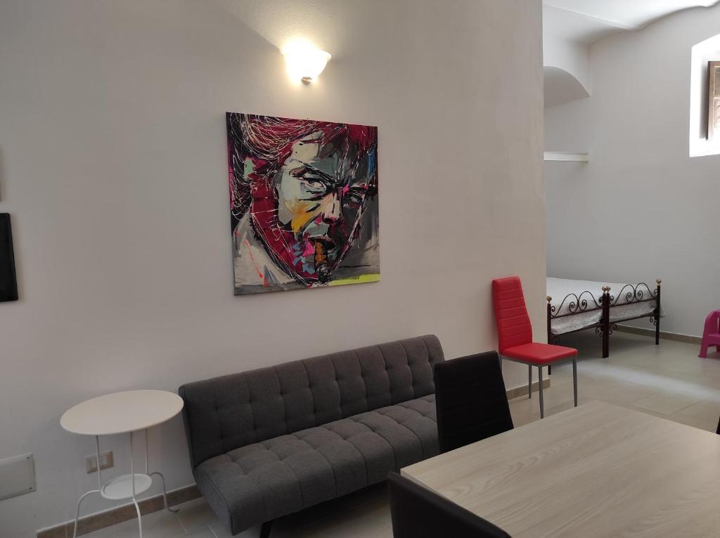 A seating area at Appartamento Marta
