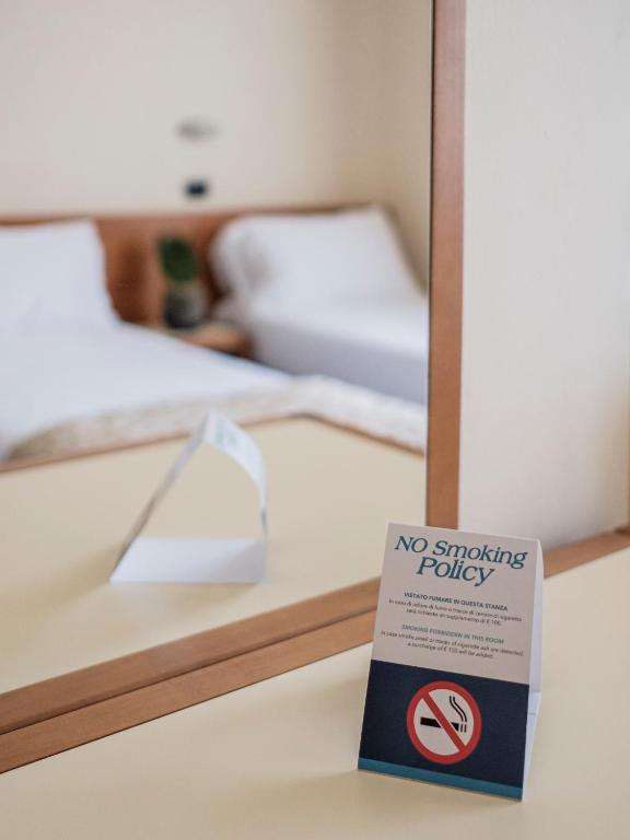 Postel nebo postele na pokoji v ubytování Hotel Lory