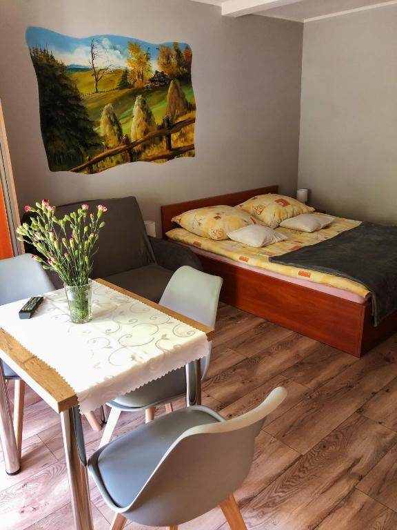 Postel nebo postele na pokoji v ubytování Pokoje Beata