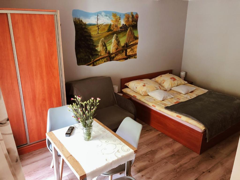 Postel nebo postele na pokoji v ubytování Pokoje Beata